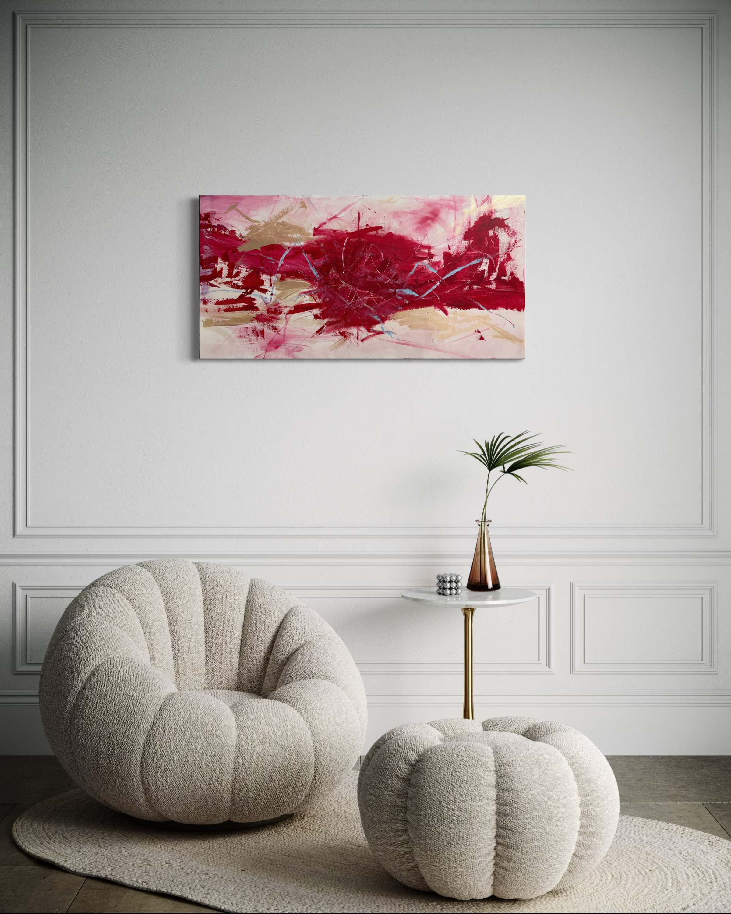 Sadie Mae's abstract painting hung in an elegant room with a sculptural boucle chair